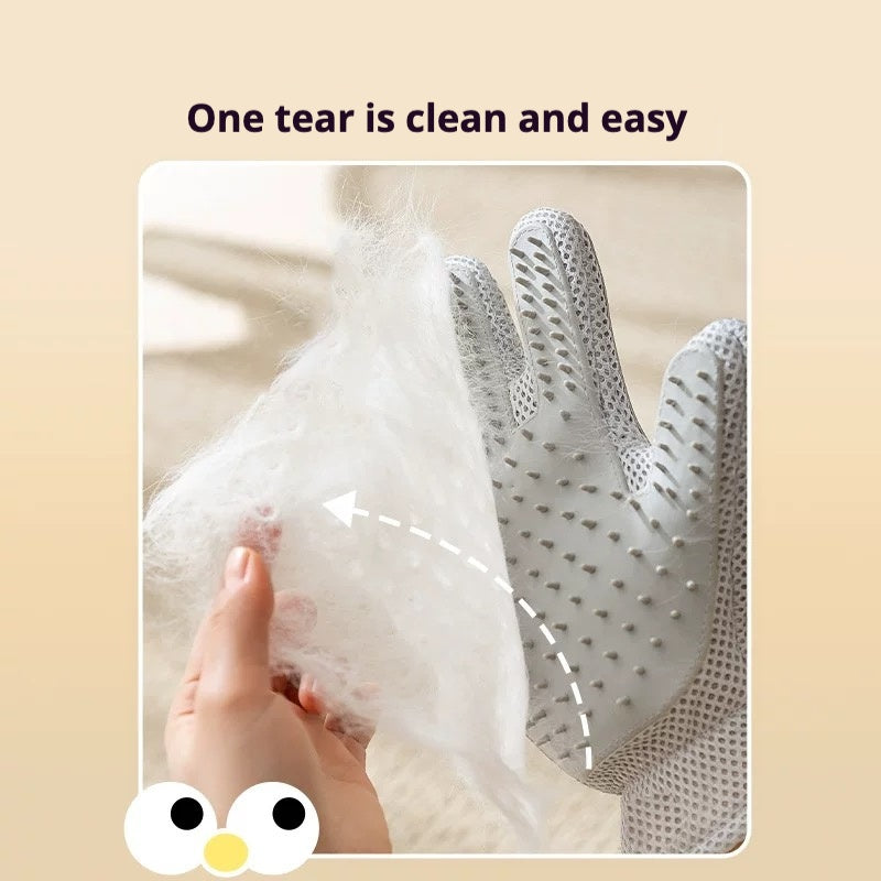 Gray grooming glove with collected pet hair being peeled off easily