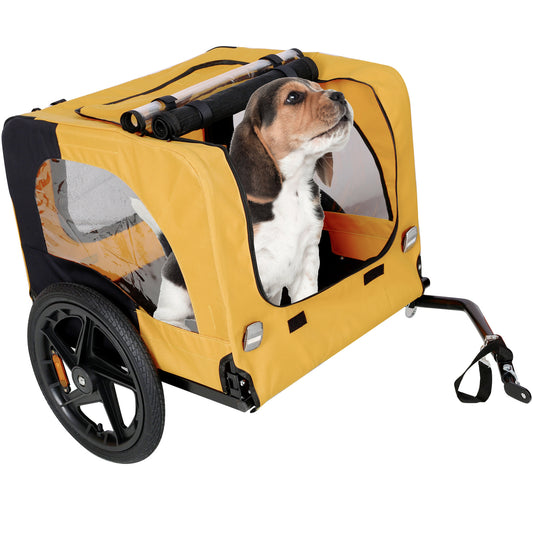 Close-up of beagle inside foldable yellow dog bike trailer with mesh windows