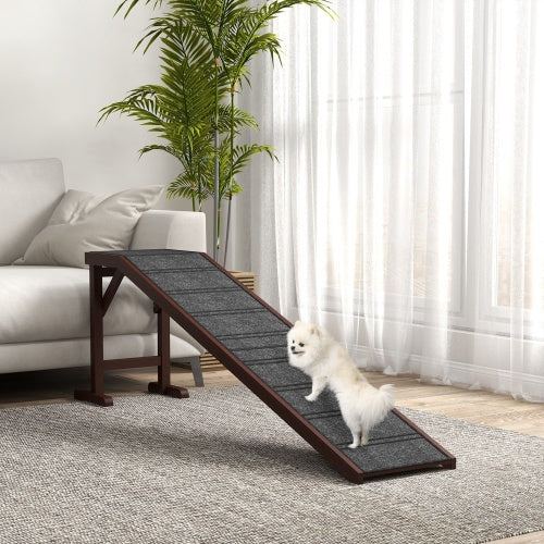 Small dog climbing wooden ramp in living room, gentle slope for seniors