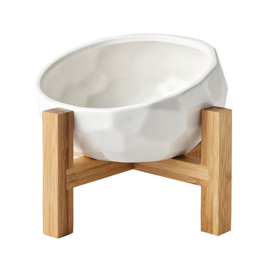 White ceramic tilted pet bowl on bamboo stand for cats and small dogs